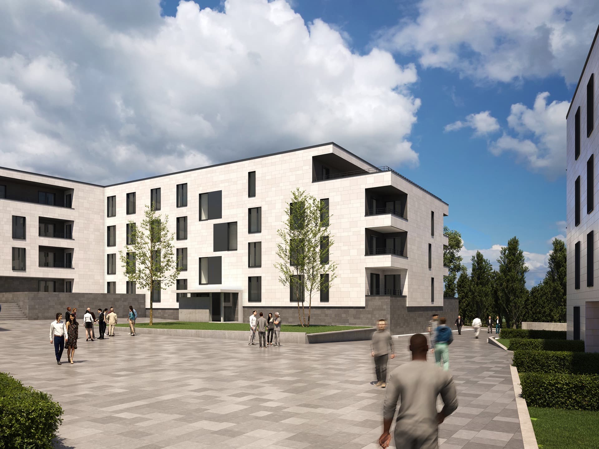 Résidence Daytona, bâtiment aux lignes modernes, avec une façade lumineuse en pierre blanche et soubassement en pierre grise. Encadrement des huisseries en gris anthracite